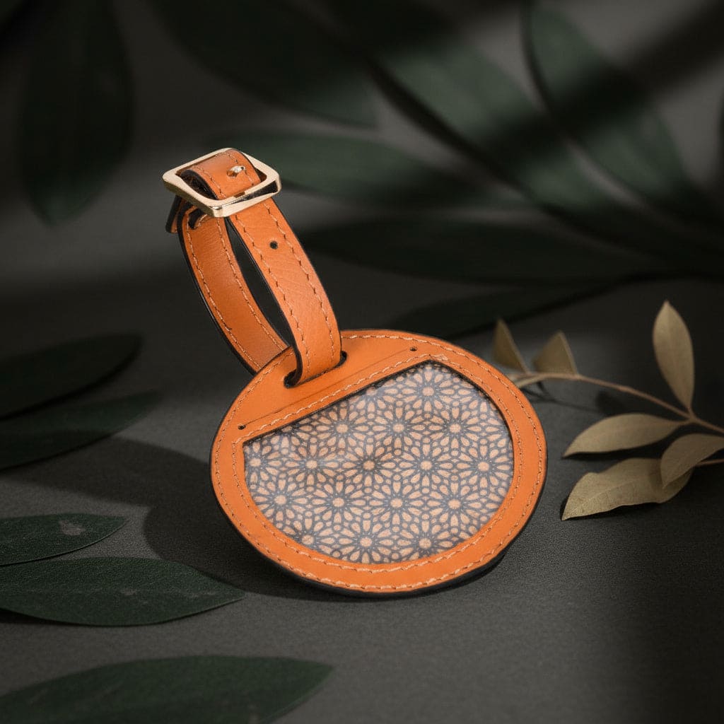 Tan circular plant leather travel tag made with cork and sustainable materials