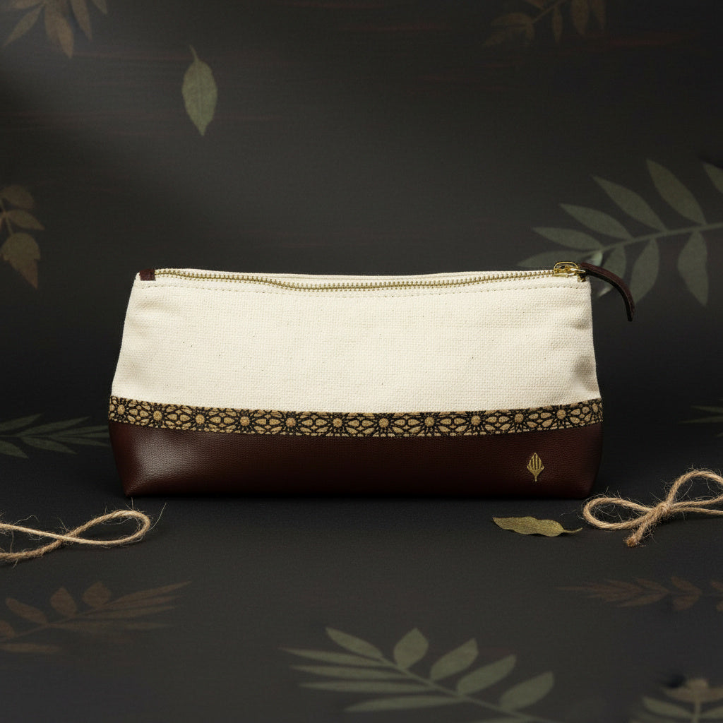 Plant leather travel utility kit in off white with cork and maroon accents by Green Hermitage, a sustainable vegan organiser for toiletries and travel essentials.