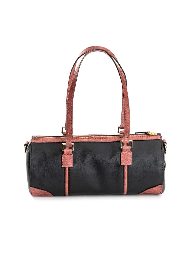 Back view of the Salacia plant leather bowler bag in black and madder red, showcasing the rear design, handcrafted from fairtrade canvas, cactus leather and malai leather.