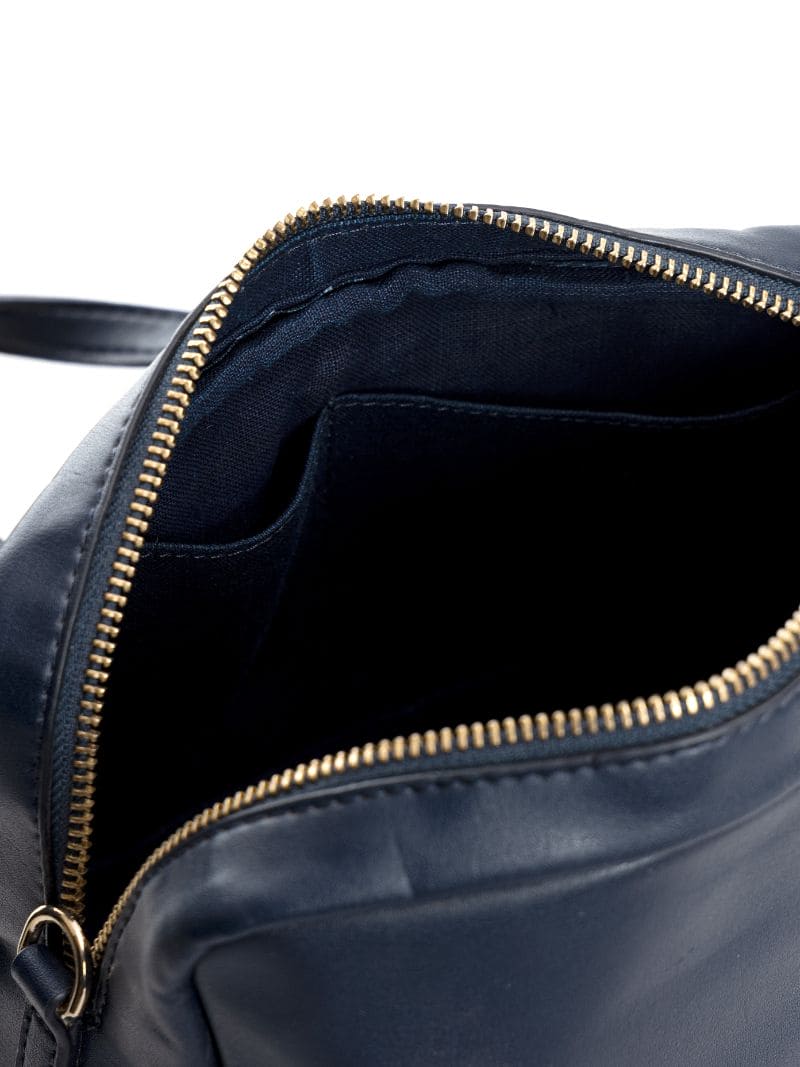 Interior view of navy blue plant leather satchel crossbody bag showing zipper opening, inner lining, and organized compartments for essentials