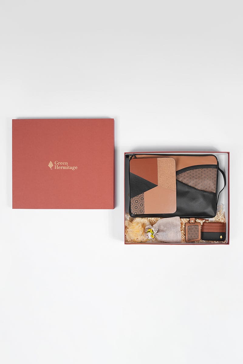 Workday Wonders office gift set by Green Hermitage packaged in luxury gift box with plant leather laptop sleeve, mouse pad, card wallet and keychain
