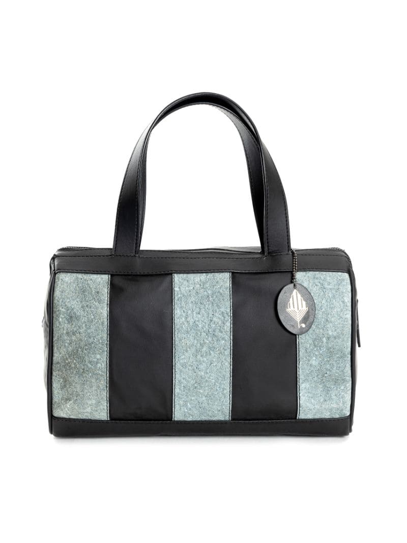 Back view of the Chloris plant leather bowler bag in black and dark grey, handcrafted from cactus leather and Malai leather with dual top handles.