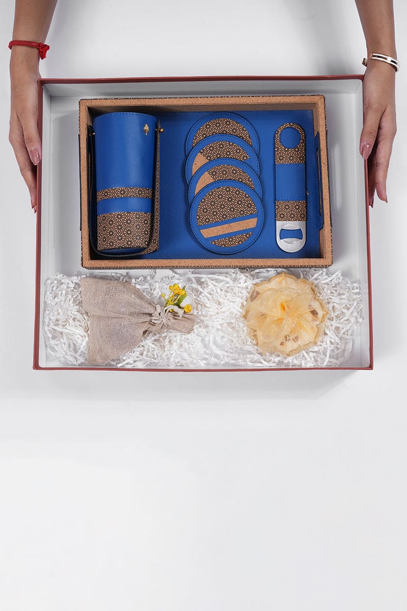 Luxury bar gift box set with bottle holder, coasters and opener presented in premium packaging by Green Hermitage