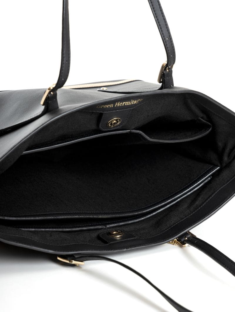 Minerva black plant leather tote bag interior showing compartments and structured storage design