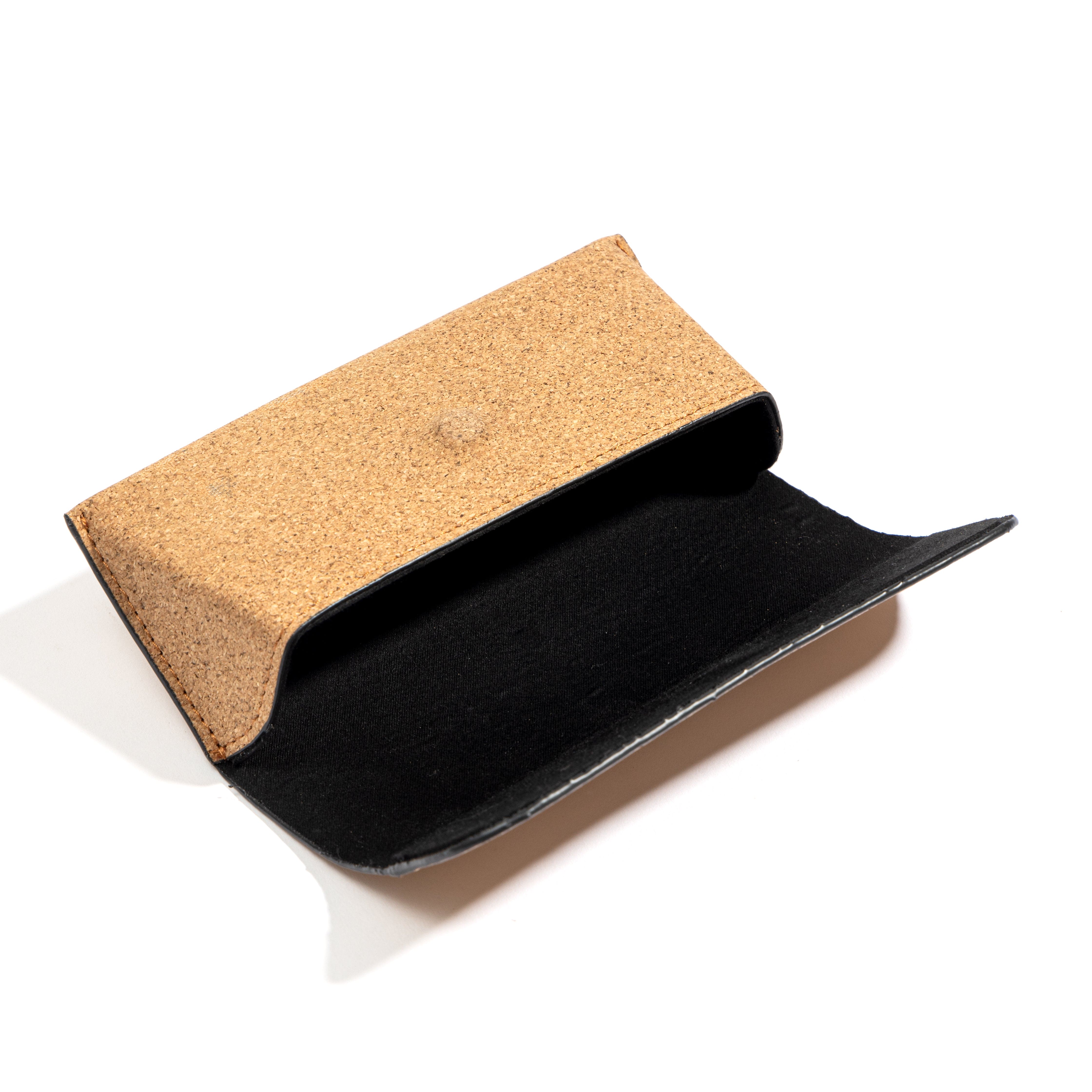 Open plant leather eyewear case interior from the Noir Holiday Travel Set by Green Hermitage showing protective lining