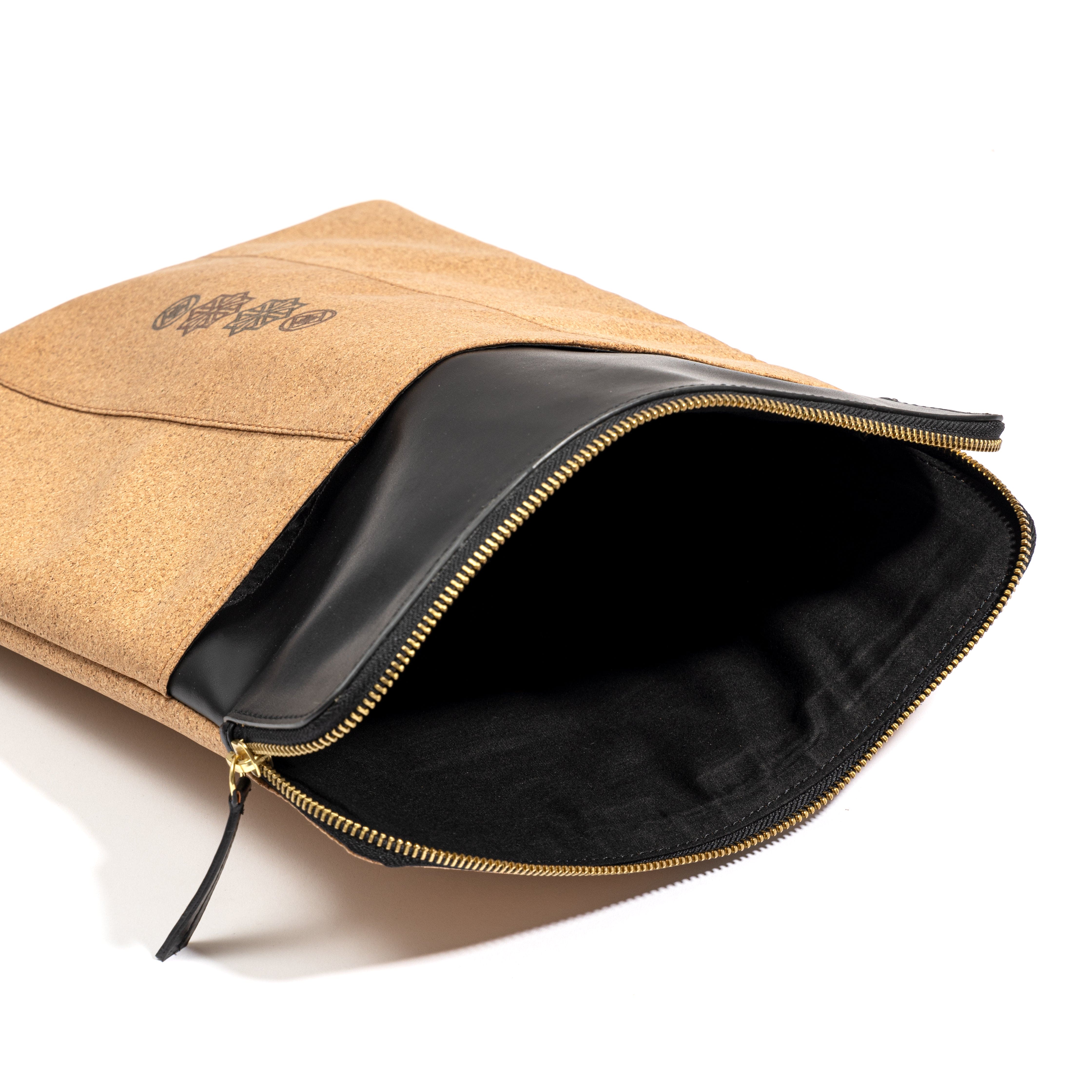 Plant leather laptop sleeve with charger pocket for organised travel and work essentials