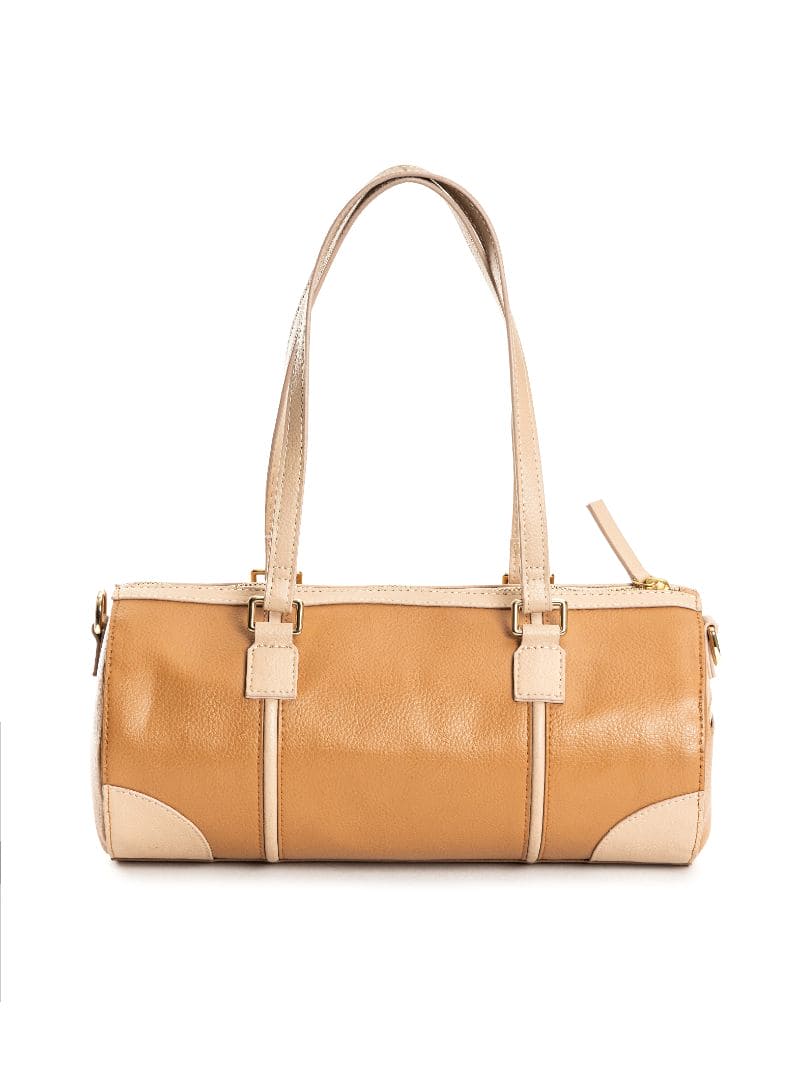 Back view of the Salacia plant leather bowler bag in caramel and almond, showcasing the handcrafted plant-based apple leather, fairtrade canvas, and structured cylindrical silhouette.