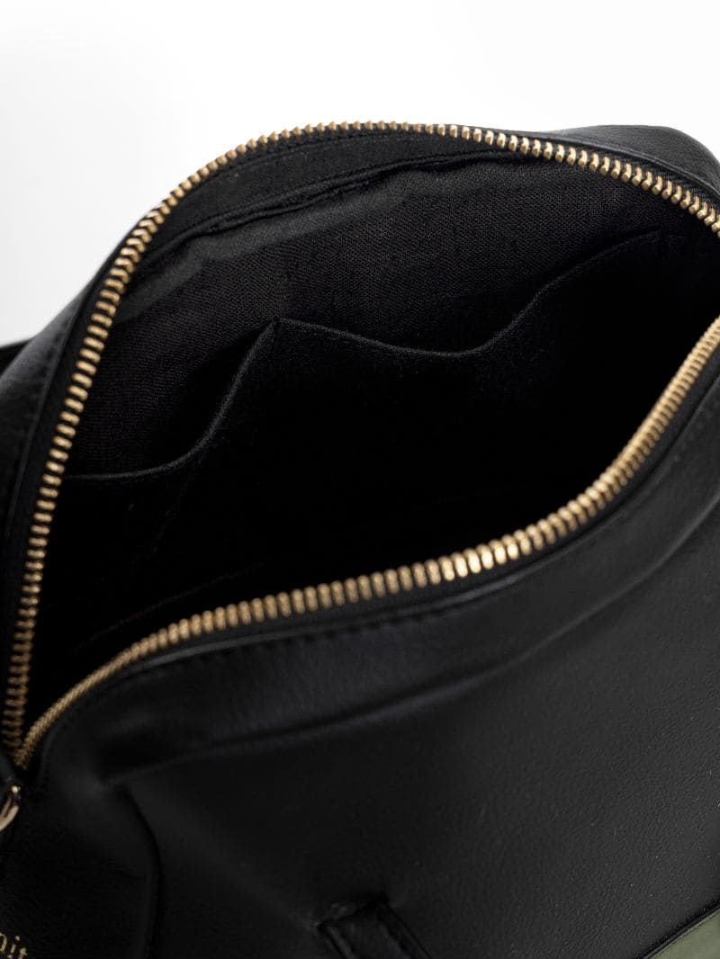 Interior view of Vanadey plant leather satchel crossbody bag showing compartments and zipper closure