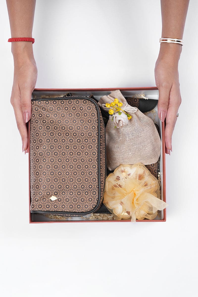 Luxury travel gift box by Green Hermitage with plant leather travel pouch and accessories presented in sustainable gift set