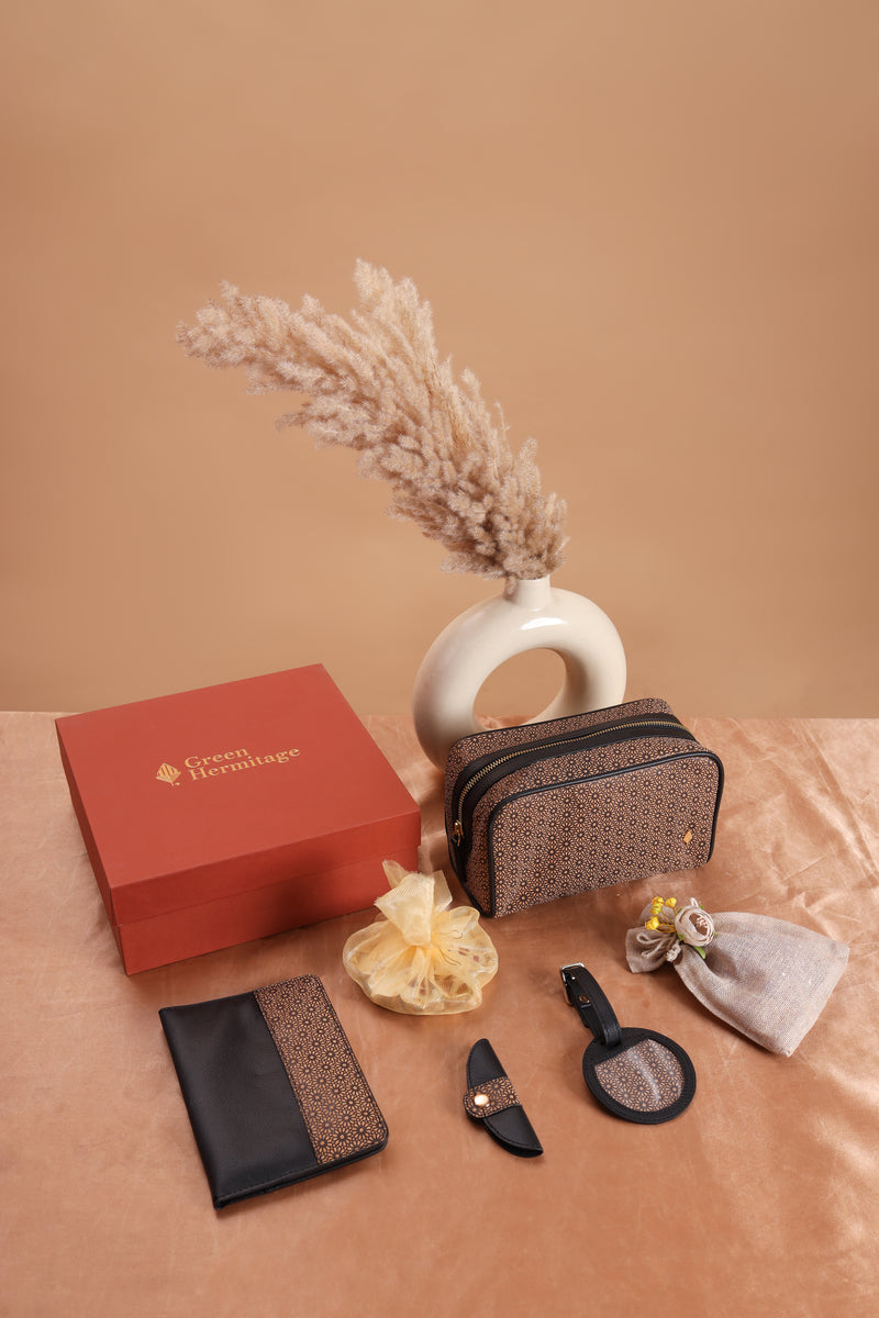 Voyagers Travel Gift Set by Green Hermitage featuring plant leather passport holder, travel tag, cable organiser and travel pouch with luxury gift box
